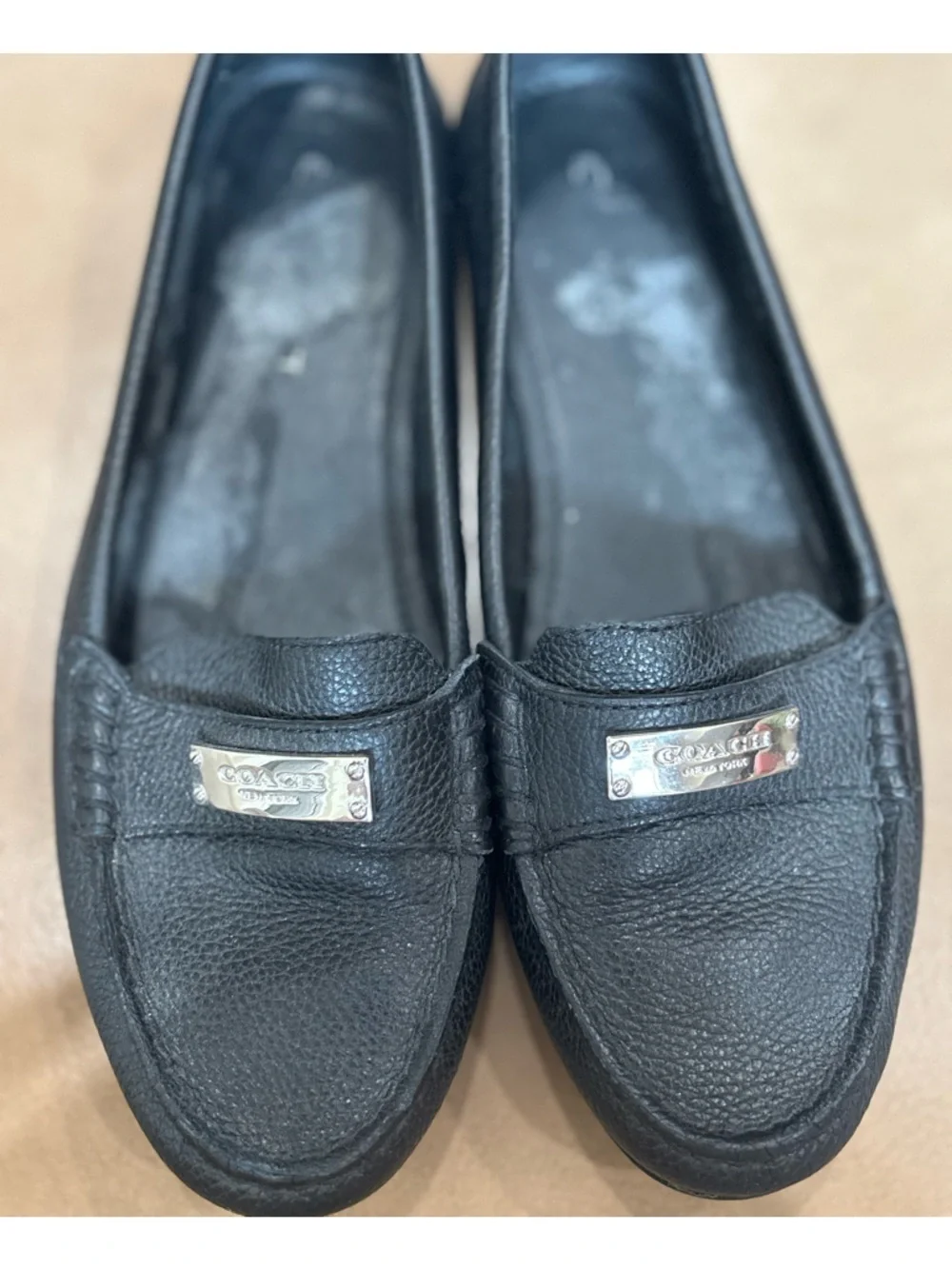 Coach minimalist Black Pebbled Leather Loafers with Silver Plaque